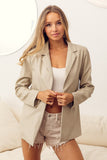 This stunning blazer is on trend and comes in a gorgeous oatmeal color